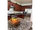 Kitchen with granite countertops and stainless steel appliances at 2621 Slide Canyon Ave, North Las Vegas, NV 89081