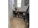 Laundry room with built-in shelving and a refrigerator at 2621 Slide Canyon Ave, North Las Vegas, NV 89081