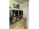 Bright laundry room with LG washer and dryer and built-in storage at 2621 Slide Canyon Ave, North Las Vegas, NV 89081