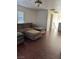Spacious living room featuring a sectional sofa and hardwood floors at 2621 Slide Canyon Ave, North Las Vegas, NV 89081