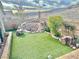 Landscaped backyard oasis with a water feature and artificial turf at 2787 Sunken Ship St, Laughlin, NV 89029