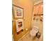 Small bathroom with updated toilet and storage at 2787 Sunken Ship St, Laughlin, NV 89029