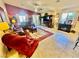 Bright living room featuring a tiled floor, comfy furniture, and a fireplace at 2787 Sunken Ship St, Laughlin, NV 89029