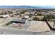 Aerial view showcasing house, yard, and surrounding area at 2931 Rodeo Ave, Pahrump, NV 89048