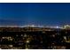 Night time view of the illuminated Las Vegas skyline at 30 Olympia Outlook Dr, Las Vegas, NV 89141