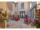 Private courtyard with fireplace and seating area at 30 Olympia Outlook Dr, Las Vegas, NV 89141