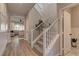 Bright entryway with hardwood floors and a staircase at 319 Cooper Hawk Ct, Las Vegas, NV 89138