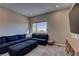 Comfortable Gathering room featuring a sectional sofa and built-in shelving at 319 Cooper Hawk Ct, Las Vegas, NV 89138