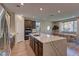 Modern kitchen with a large island and stainless steel appliances at 319 Cooper Hawk Ct, Las Vegas, NV 89138
