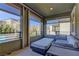 Relaxing covered patio with outdoor seating and views of the neighborhood at 319 Cooper Hawk Ct, Las Vegas, NV 89138