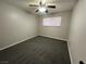 Bright bedroom with ceiling fan and grey carpeting at 3600 Broadway Ave, North Las Vegas, NV 89030