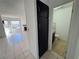 Bathroom with granite vanity, tile flooring, storage cabinet, and toilet at 3891 Terrazzo Ave, Las Vegas, NV 89115