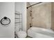 This bathroom features a tiled shower over tub and convenient shelving at 3891 Terrazzo Ave, Las Vegas, NV 89115