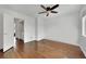 This bedroom features wood floors and a ceiling fan at 3891 Terrazzo Ave, Las Vegas, NV 89115
