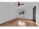 Bright bedroom with wood floors, ceiling fan and window at 3891 Terrazzo Ave, Las Vegas, NV 89115