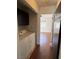 Laundry closet with washer, dryer and built-in shelving at 3891 Terrazzo Ave, Las Vegas, NV 89115