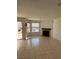 Living room with tile floors and fireplace at 3891 Terrazzo Ave, Las Vegas, NV 89115