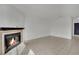 Inviting living room features a cozy fireplace, tile flooring, and neutral walls for a comfortable atmosphere at 3891 Terrazzo Ave, Las Vegas, NV 89115