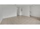 Spacious and bright living room with neutral tile flooring, offering a versatile living space at 3891 Terrazzo Ave, Las Vegas, NV 89115