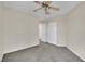 Well-lit bedroom with double door closet and ceiling fan at 476 Tiger Lily Way, Henderson, NV 89015