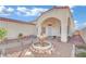 Charming courtyard with a fountain and pathway leading to the entrance at 476 Tiger Lily Way, Henderson, NV 89015