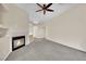 Living room with fireplace and carpeted floor at 476 Tiger Lily Way, Henderson, NV 89015