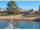 A picturesque backyard with water feature offers a serene view of this lovely home at 5130 Agio Ave, Pahrump, NV 89061