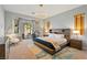 A cozy primary bedroom with modern decor and a sliding door to outdoor space at 5130 Agio Ave, Pahrump, NV 89061
