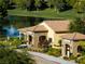Clubhouse with a restaurant and ball room overlooking a fountain feature in a beautiful pond at 5130 Agio Ave, Pahrump, NV 89061