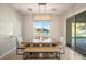 Bright dining area features bench seating and lake view from window at 5130 Agio Ave, Pahrump, NV 89061