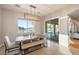 Dining room area with sliding doors to the outside at 5130 Agio Ave, Pahrump, NV 89061