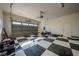 Spacious garage with a striking checkered floor and ample storage space, ready for projects and vehicles at 5130 Agio Ave, Pahrump, NV 89061