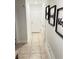 Bright hallway with tile floors and wall decor at 5197 Silica Chalk Ave, Las Vegas, NV 89115