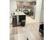 Modern kitchen with stainless steel appliances and island at 5197 Silica Chalk Ave, Las Vegas, NV 89115