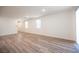 Bright living room with wood-look floors and neutral colors at 6586 Rustic Saddle Ct, Las Vegas, NV 89141