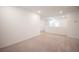 Spacious loft area with carpet and access to other rooms at 6586 Rustic Saddle Ct, Las Vegas, NV 89141