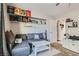 Inviting living room showcasing a comfortable sectional sofa and ample shelving at 7277 Abbeyville Dr, Las Vegas, NV 89119