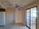 Bright dining area with tile flooring and sliding glass door access to a patio at 6653 W Tropicana Ave # 101, Las Vegas, NV 89103