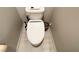 Clean and modern bathroom with a toilet and an electronic bidet at 10766 Wild Parsley Ave, Las Vegas, NV 89129