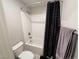 Main bathroom with shower/tub combo and granite countertop at 10766 Wild Parsley Ave, Las Vegas, NV 89129