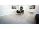 Elegant dining room featuring a wood table and six modern chairs at 10766 Wild Parsley Ave, Las Vegas, NV 89129