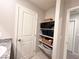 Linen closet with shelving for folded towels and blankets at 10766 Wild Parsley Ave, Las Vegas, NV 89129