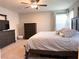 Spacious main bedroom with large bed and ample storage at 10766 Wild Parsley Ave, Las Vegas, NV 89129