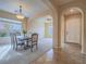 Dining room with decorative chandelier and hardwood floors at 10840 Villa Torre St, Las Vegas, NV 89141