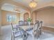 Bright dining room with hardwood floors and archways at 10840 Villa Torre St, Las Vegas, NV 89141