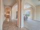 Elegant hallway with archways and tile flooring at 10840 Villa Torre St, Las Vegas, NV 89141