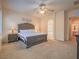 Main bedroom with ensuite bathroom access and ample space at 10840 Villa Torre St, Las Vegas, NV 89141