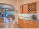 Convenient wet bar with wine rack and coffee bar at 10840 Villa Torre St, Las Vegas, NV 89141