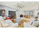 Open concept living room with fireplace and lots of light at 1170 N Water St, Henderson, NV 89011