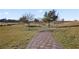 Brick pathway winding through a grassy park area at 1170 N Water St, Henderson, NV 89011